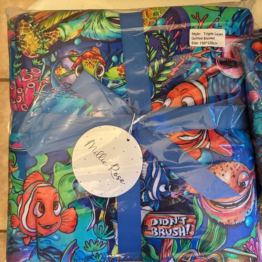 Millie rose triple layer quilted bamboo Nemo blanket